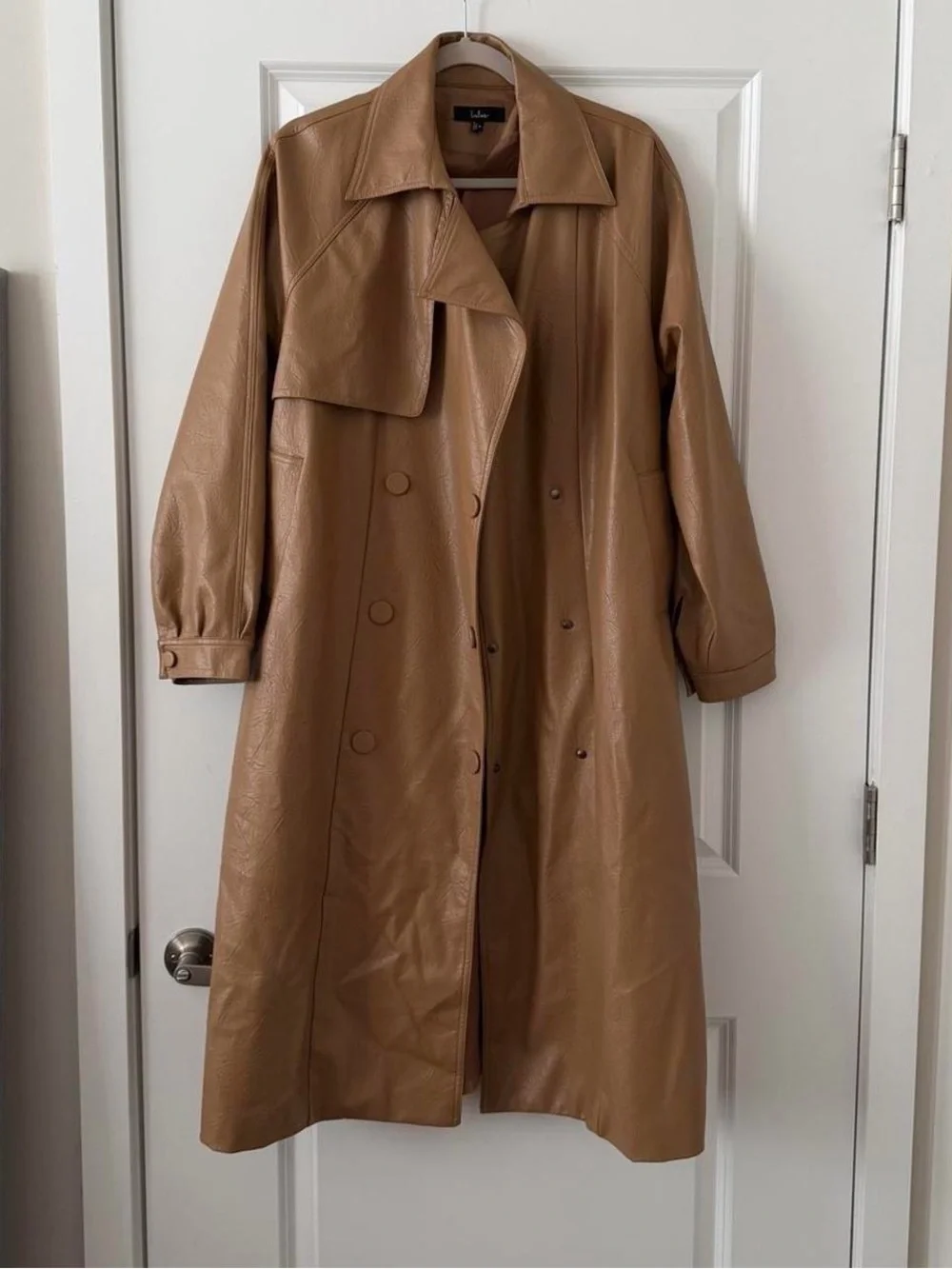 Tan vegan leather trench coat with belt